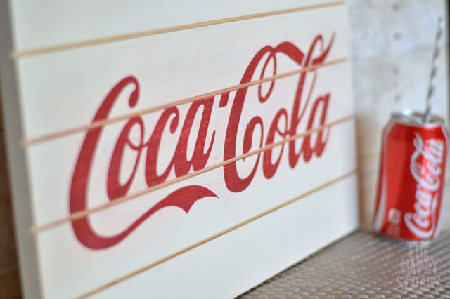 This Simple Coca-Cola Sign came together in only about 30 minutes and it makes a great gift for anyone who loves Coca-Cola. 