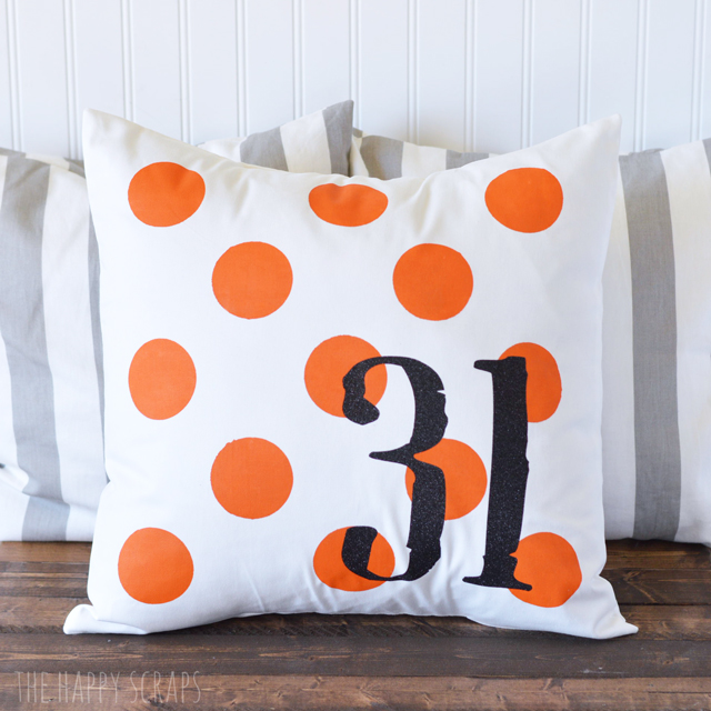 This Halloween Polka Dot Pillow is easier to make than you'd think + it will bring a fun pop of color to your Halloween decor!