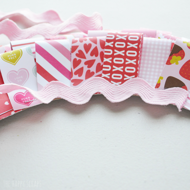 Creating this Be Mine Valentine Wreath is simple and will be a fun piece to add to your Valentine's day decor. Get the tutorial at The Happy Scraps. 