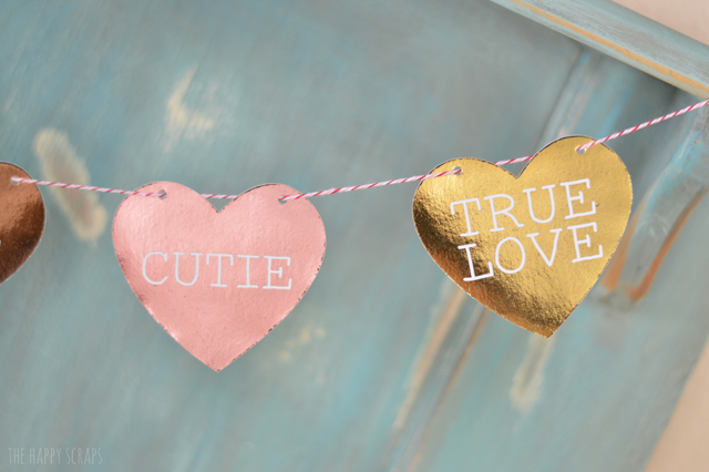 This Foiled Conversation Heart Banner is the perfect addition to any Valentine's Day decor. It doesn't take long to create either.