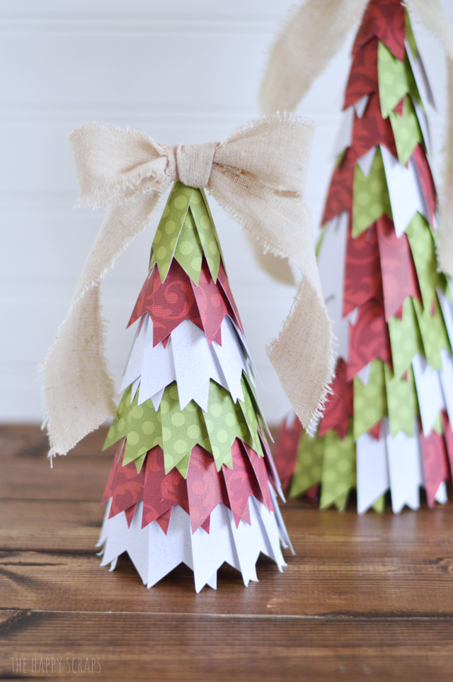 These Paper Christmas Trees are so easy to make and are the perfect addition to any other Christmas decor. Stop by the blog to learn how to make them. 