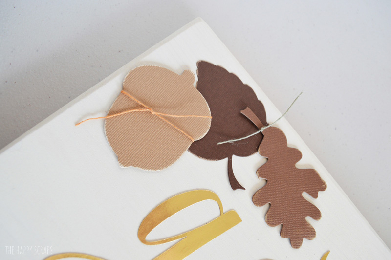 Make this beautiful DIY Gather Thanksgiving Sign to have on display for your Thanksgiving holiday. The colors, leaves & acorns are perfect for Thanksgiving.