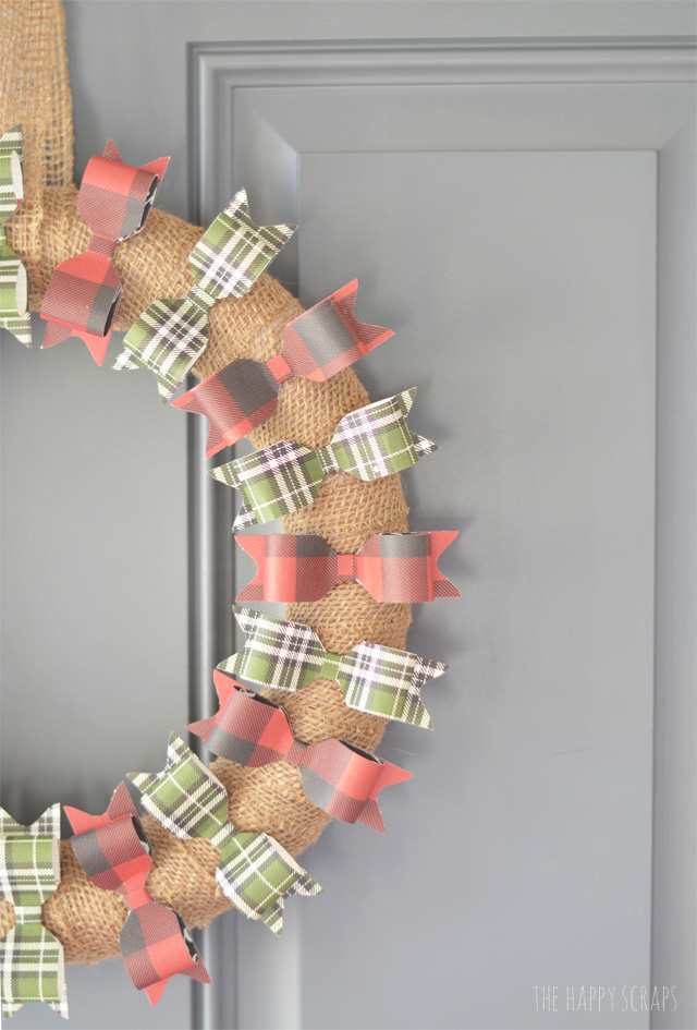 Adorn your front door with this simple + cute Paper Bow Christmas Wreath this holiday season. I'm sharing the simple tutorial on the blog. 
