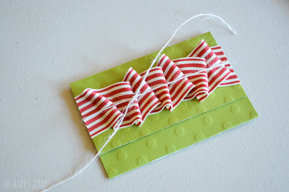 Giving gift cards this year? Put together this Simple Gift Card Holder to hold those cards. They are quick + easy to make! 