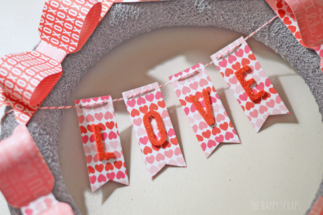 Decorate your front door for Valentine's day with this fun Valentine Paper Bow Wreath. It's easy to make. I'm sharing the tutorial on the blog. 