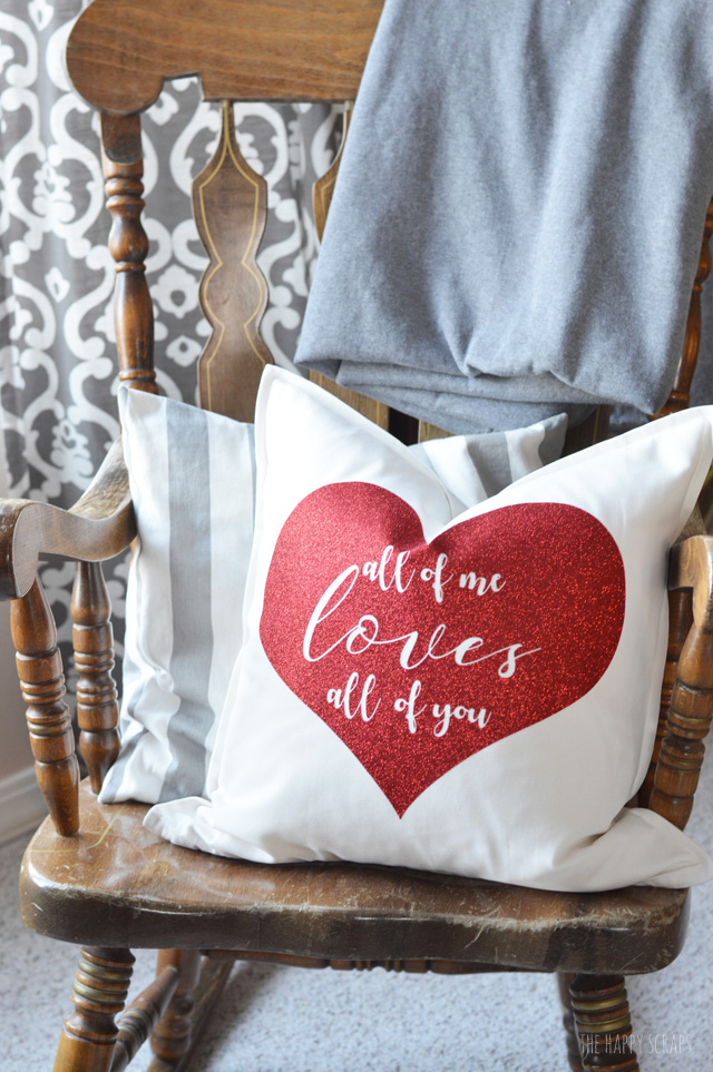Glitter Iron-on vinyl is so fun to work with! It's mess free and you still get the shimmer. Learn how I used it to make this Valentine's Day Pillow. 