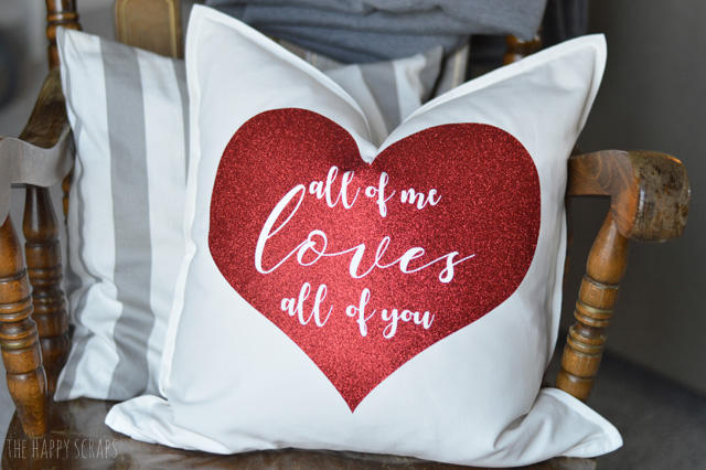 Glitter Iron-on vinyl is so fun to work with! It's mess free and you still get the shimmer. Learn how I used it to make this Valentine's Day Pillow. 