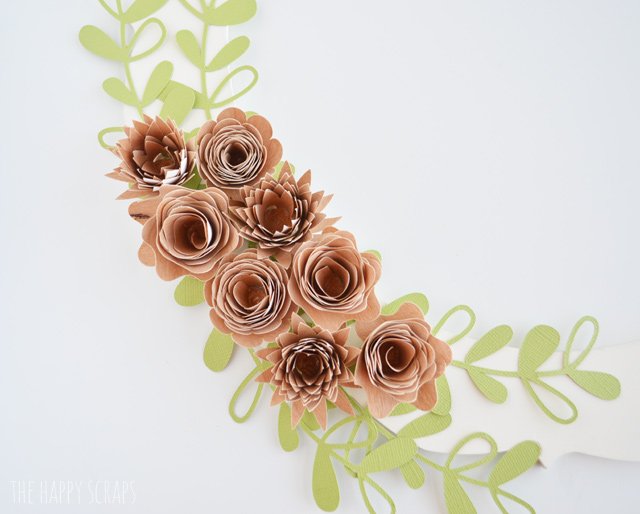 If you're looking for a pretty wreath for Spring or even to leave up all year, check out this Rolled Wood Flower Wreath that I made with the help of my Cricut Explore Air 2. I'm sharing it on the blog. 