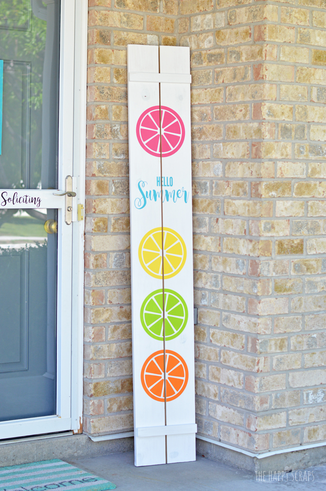 Does your porch needs a little splash of color for summer? This Hello Summer Front Porch Sign is the project for you! Get the tutorial at The Happy Scraps.