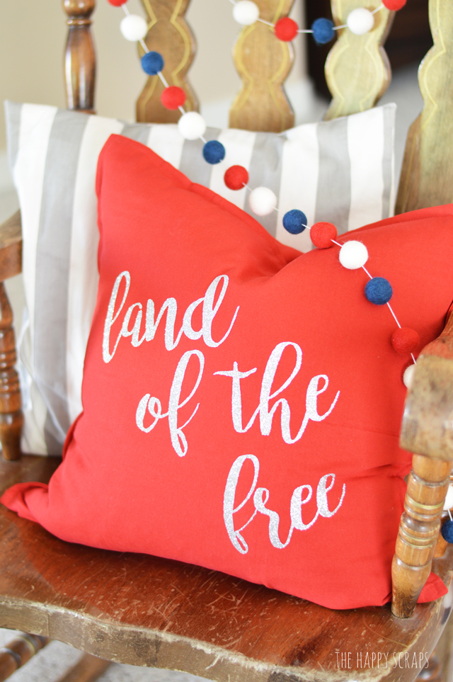 Decorate with throw pillows for the 4th of July. They are easy and fun to make! Get the details for this Land of the Free 4th of July Pillow on the blog. 