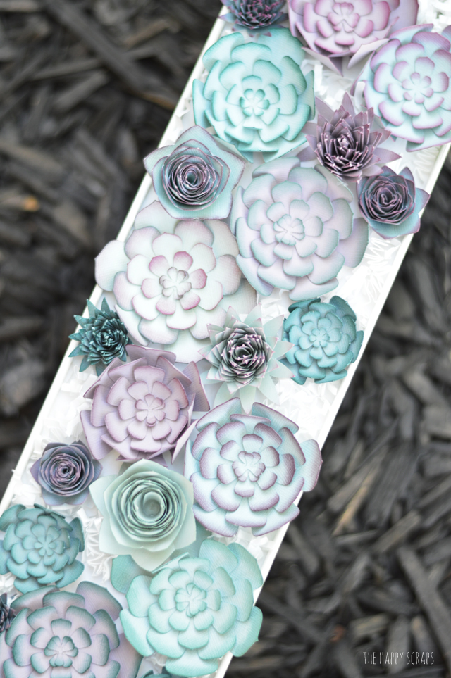 Create a stunning Paper Succulent Centerpiece that doesn't need to be watered or taken care of. It's a great piece for anywhere in the home! 