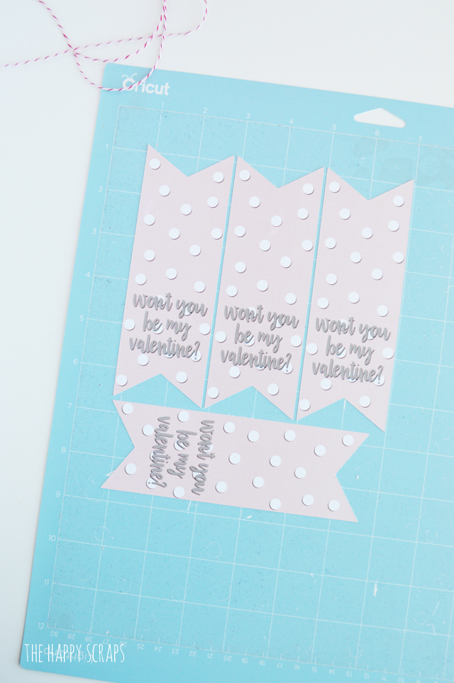 Putting together this Valentine Treat Bag is simple with this fun "Won't you be my Valentine?" tag. Get the print on the blog, and use your Cricut to cut it out! 