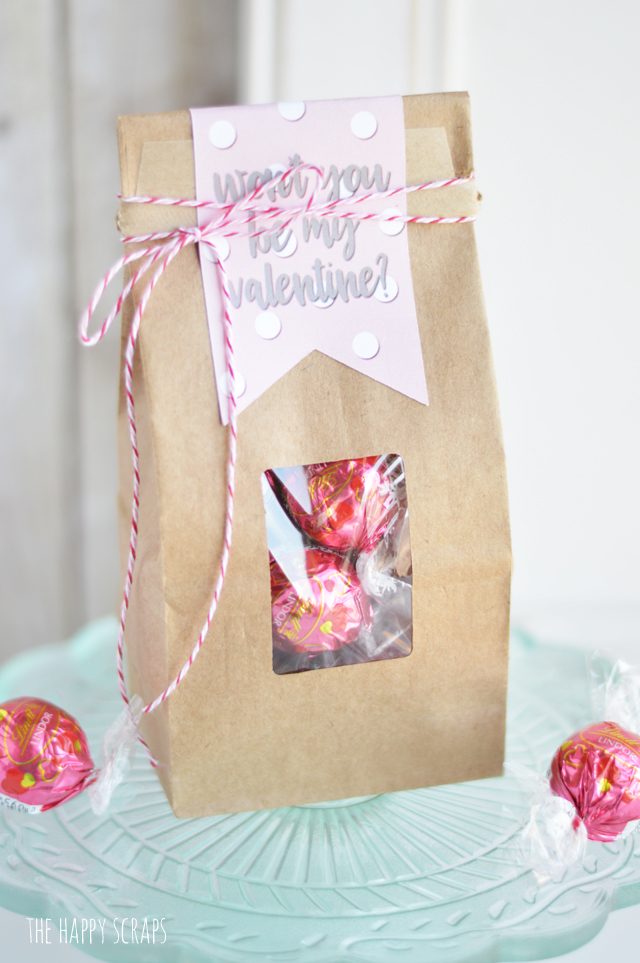 Putting together this Valentine Treat Bag is simple with this fun "Won't you be my Valentine?" tag. Get the print on the blog, and use your Cricut to cut it out! 