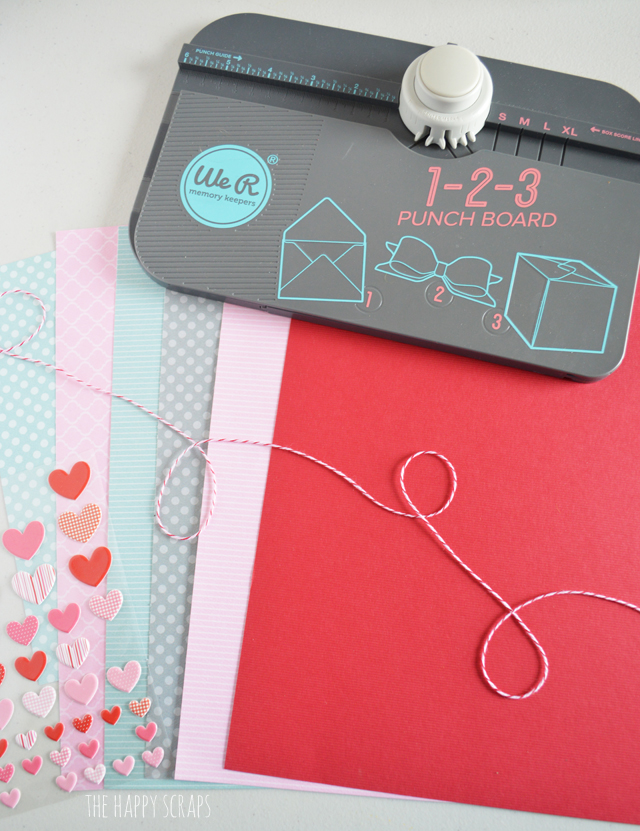 This Mini Envelope Valentine Banner is the perfect addition to your Valentine decor. The mini envelopes are so cute and the puffy heart stickers make the perfect "stamps." Create your own with the tutorial on the blog. 