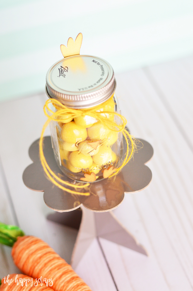 This Mini Chick Jar Easter Gift is the perfect little gift to put together for anyone for Easter. They are sure to love it, and the jar is just the right size for the perfect amount of chocolate candies. 