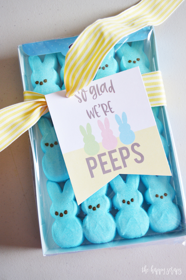 This So Glad We're Peeps Easter Gift is so quick + simple to put together. Grab the printable tag from The Happy Scraps, cut them out, and tie them onto a package of peeps with a cute ribbon. 