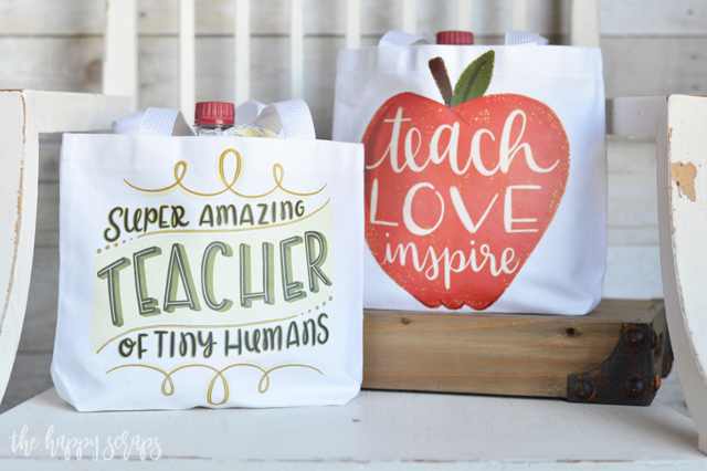 This Teacher Appreciation Gift Bag with Cricut Iron-on Designs is the perfect gift for all those school teachers! Fill it up with some fun supplies and their favorite treats. They will love what's inside, but they'll love the cute bag even more!!