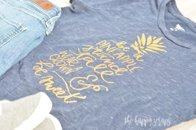 Everyone needs one of these Be A Pineapple Glitter Tee shirts. The glitter makes it so fun and sparkly + there is no mess when using glitter iron-on! Get the details for this from The Happy Scraps. 