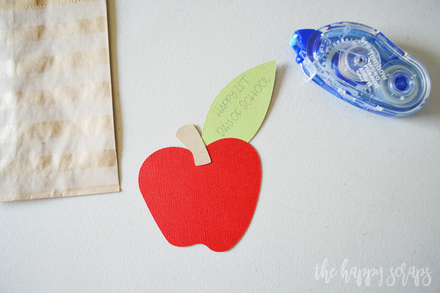 These quick + easy Back to School Paper Sack Treat Bags are the perfect little treat sack to give your kids when they get home from school on the first day!