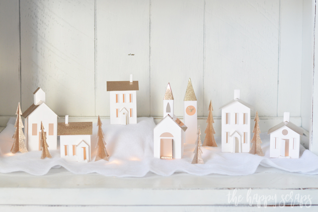 Creating this beautiful DIY Christmas Village with the Cricut Maker is fun and easy! This is the perfect project to get you in the holiday spirit! 