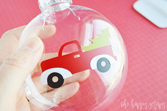 You'll have this DIY Red Truck Christmas Ornament put together in no time! Also learn how to layer multiple colors of vinyl! 