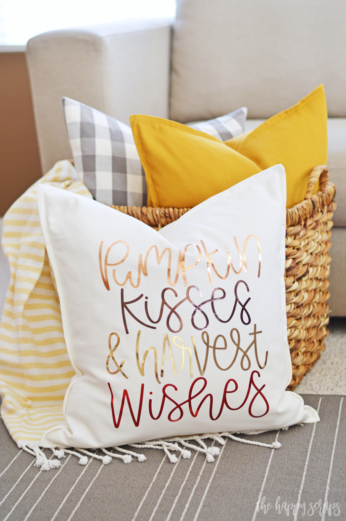 Considering purchasing a Cricut machine? Find out What I Love About the Cricut Explore Air 2 + make this Fall Harvest Pillow along with me. 