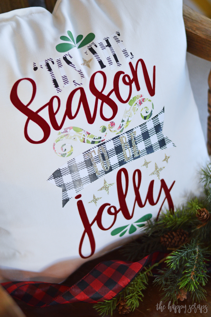 Add this fun 'Tis the Season Christmas Throw Pillow to your Christmas decor this year. Using Expressions Vinyl + your Cricut makes it easy. 