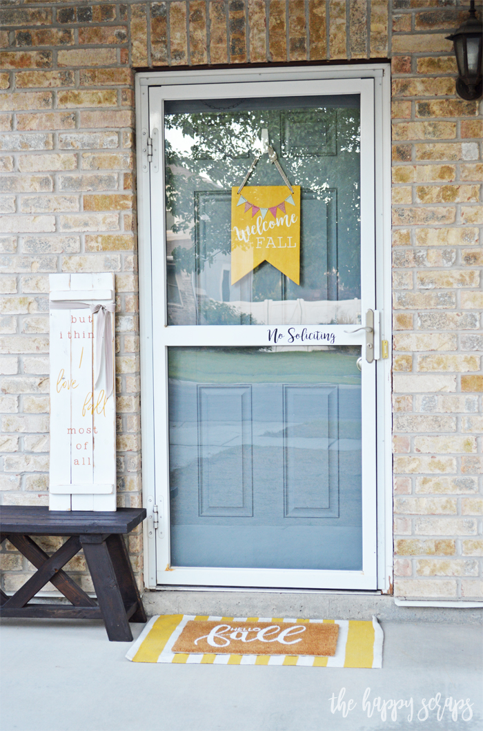 Having a DIY Hello Fall Front Porch Rug is the perfect way to welcome the fall weather! Get the details for creating your own on the blog.